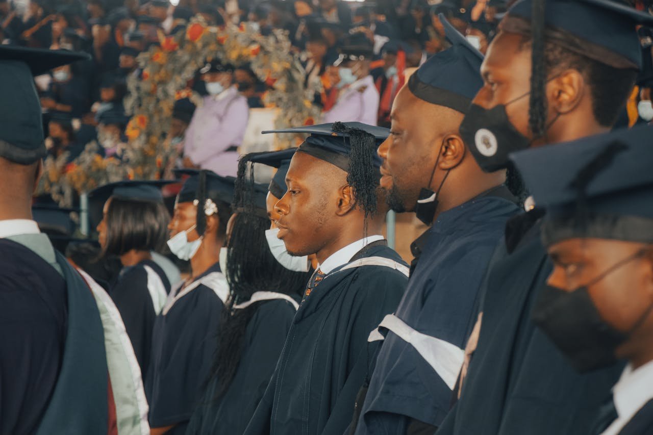 team-04 Graduates in Nigeria celebrate their academic achievements in academic regalia.